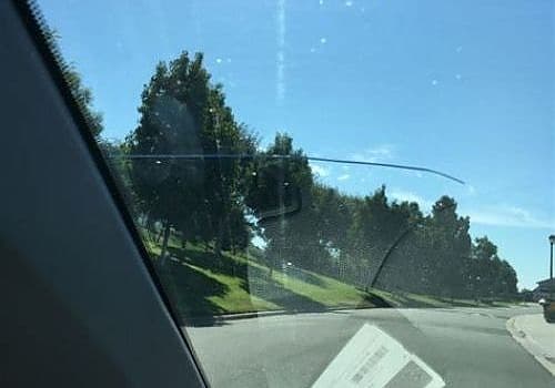 Glass Ding provides auto glass services for views like the road seen from inside a car.