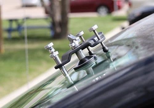 Glass Ding handles windshield cleaning on vehicles.