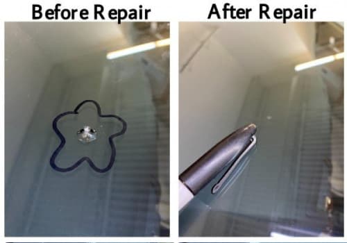 A glass door with dents is serviced by Glass Ding during mobile windshield repair in Oxford, MS.